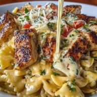 Creamy Cajun Chicken Bowtie Pasta with Garlic Cheese Sauce