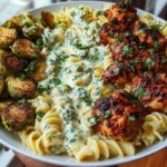 Hot Honey Cajun Chicken Alfredo with Basil Feta Swirl & Crispy Brussels Chips