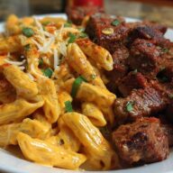 Penne with Creamy Velveeta Four-Cheese and Cajun Beef Bites